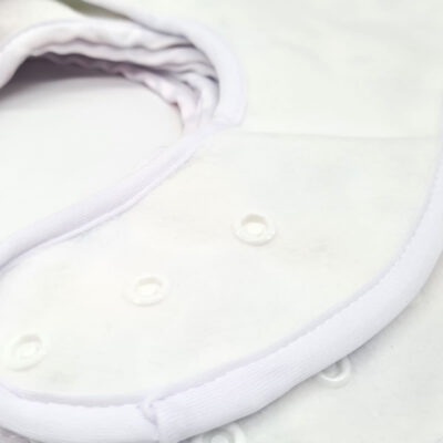 1 bavoir breveté évolutif – Coloris aléatoire mixte
