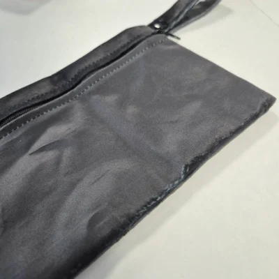 1 pochette multifonction imperméable et zippée – Minky Noir – Prix cassé